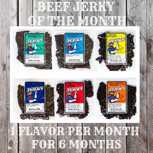 Six flavors of jerky on a wooden background with the words Beef Jerky of the MOnth 1 Flavor Per Month for 6 months