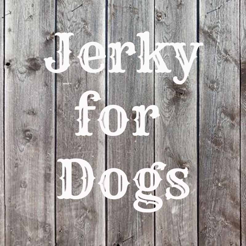 The words Jerky for dogs on a faded wood background
