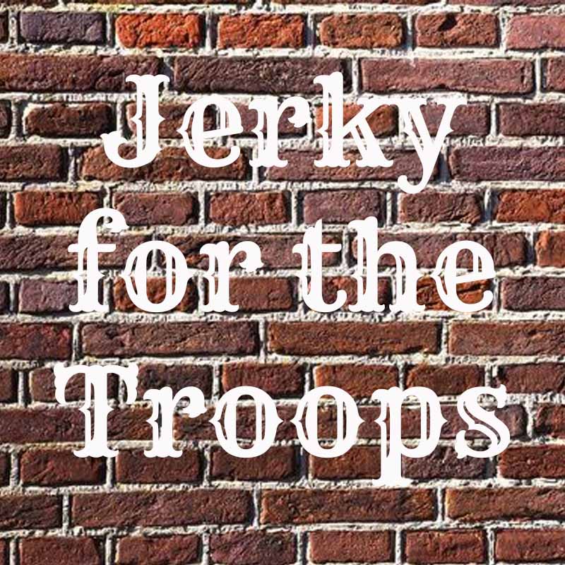 the words jerky for the troops on brick background