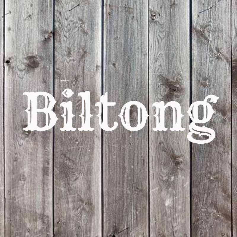 the word biltong on a wood background